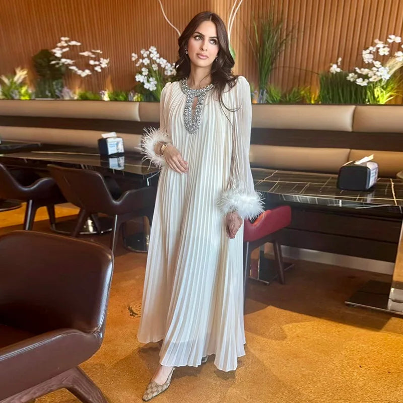 Luxury Women's Pleated Maxi Dress | Crystal Embellished Neckline & Feather Cuff Gown
